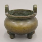 A Chinese bronze censer. 15 cm high.