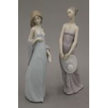 Two Lladro porcelain ladies.
