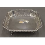 A pierced silver footed dish. 18 cm wide. 6.5 troy ounces.