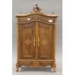 A miniature French armoire. 78 cm high.