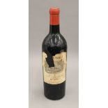 A single bottle of Chateau Lafitte Carruades Rothschild 1958. 29 cm high.