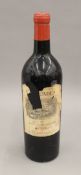 A single bottle of Chateau Lafitte Carruades Rothschild 1958. 29 cm high.