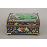 A late 19th/early 20th century cloisonne box. 12 cm wide.