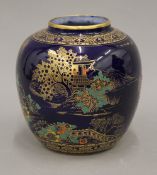 An Adderley porcelain vase decorated in the chinoiserie taste. 17 cm high.