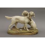 A Royal Dux porcelain model of two retrievers. 36 cm wide.