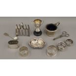 A quantity of small silver items, including napkin rings, mustards, etc. 9.