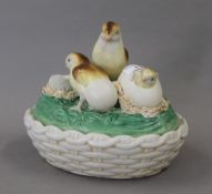 A porcelain chick dish. 18 cm wide.