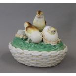 A porcelain chick dish. 18 cm wide.