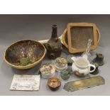 A box of miscellaneous items, including Victorian pot lids, a pottery bowl,