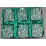 Three boxed cut crystal drinking glass sets.