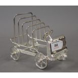 A silver plated car form toast rack. 16 cm long.