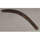 An Aboriginal boomerang. 72 cm long.