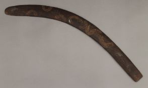 An Aboriginal boomerang. 72 cm long.