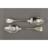 A matched pair of Georgian silver spoons. 22 cm long. 5.8 troy ounces.