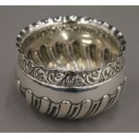 A silver fluted sugar bowl. 8 cm diameter. 69.9 grammes.