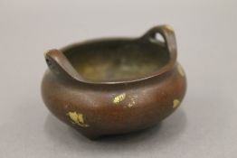 A small Chinese bronze gold splash censer. 5.5 cm wide, 3.2 cm high.