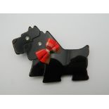 A Leo Stein scotty dog brooch. 8 cm wide.