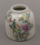 A Chinese porcelain ink pot. 6 cm high.