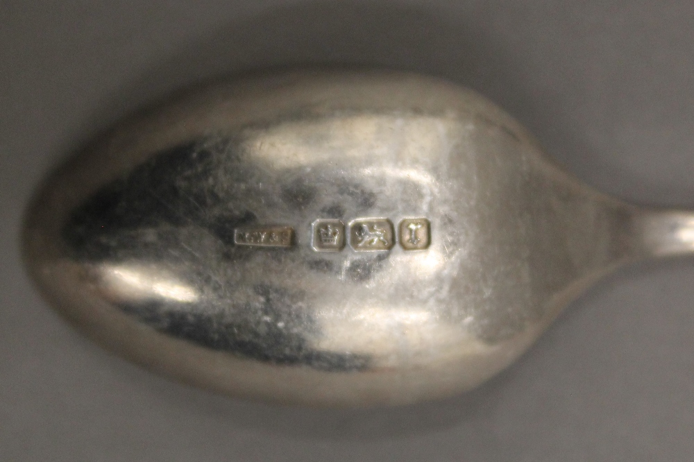 A cased set of silver apostle teaspoons and tongs. 3.2 troy ounces. - Image 6 of 10