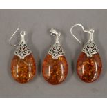 A pair of dress earrings, together with matching pendant. The latter 3.75 cm high.