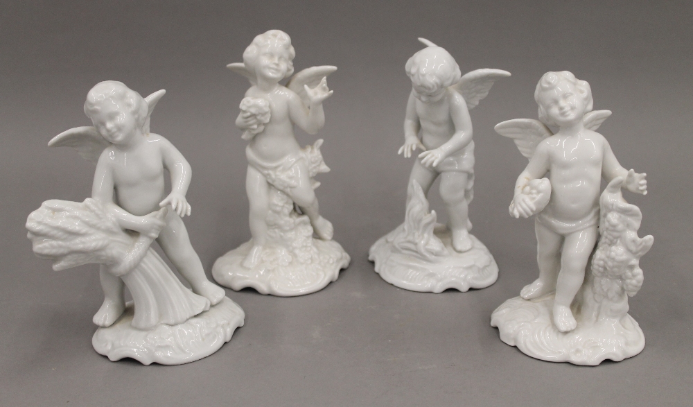 A set of four Dresden figures depicting the seasons. The largest 14 cm high.