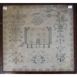 A Victorian sampler worked with a house, dated 1840, framed and glazed. 44 x 41 cm.