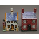 Two Staffordshire cottage form money boxes