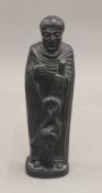 An Irish figure of Saint Colmcille. 16.5 cm high.