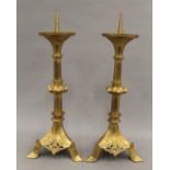 A pair of brass alter sticks. 47 cm high.