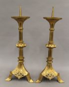 A pair of brass alter sticks. 47 cm high.