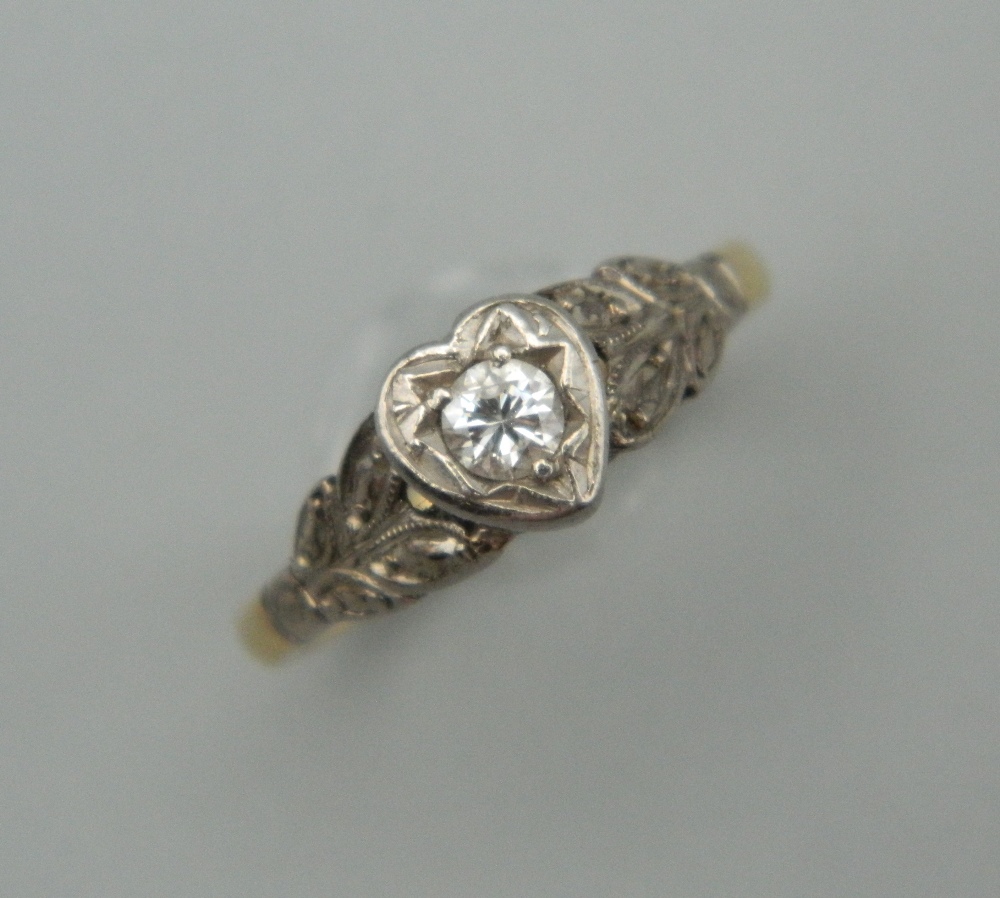 An unmarked, probably 18 ct gold diamond solitaire ring. Ring size H/I.