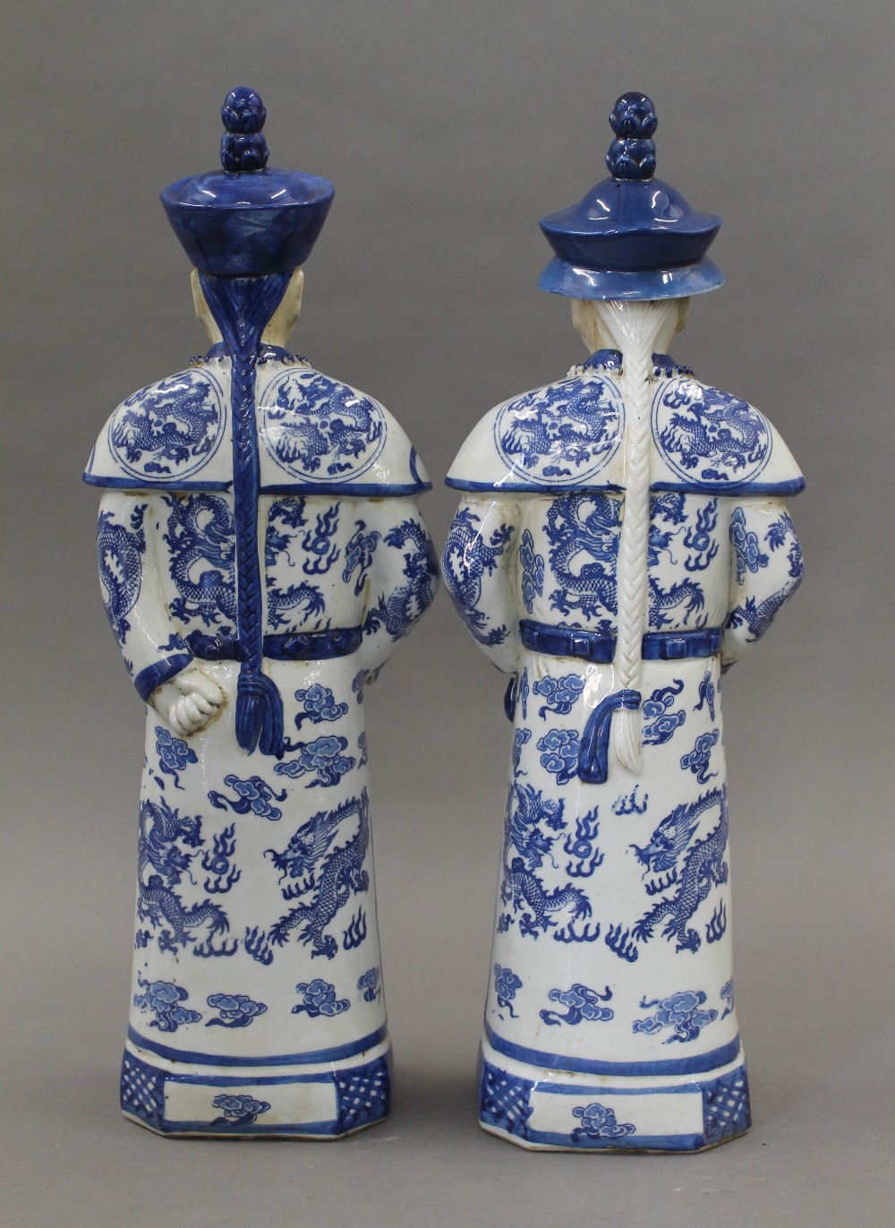 A pair of Chinese porcelain blue and white figures. The largest 43.5 cm high. - Image 2 of 2