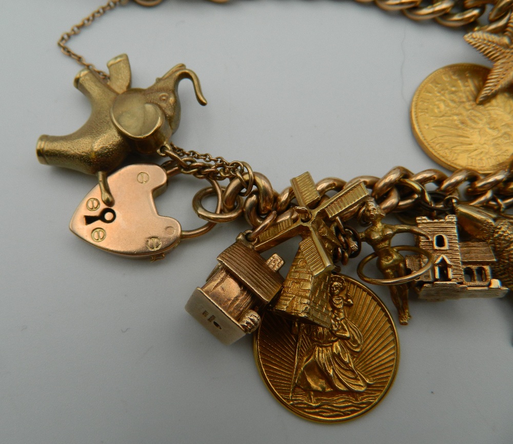 A 9 ct gold charm bracelet, set with various gold coins, including two sovereigns. 218. - Image 6 of 20