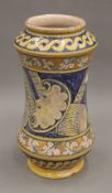 A glazed pottery Albarello. 30 cm high.