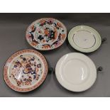 Four Victorian warming plates. The largest 27 cm diameter.