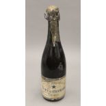 A single bottle of Moet & Chandon Epernay, 1930s. 26.5 cm high.