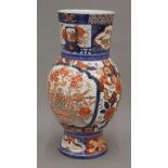 A 19th century Imari vase. 33.5 cm high.