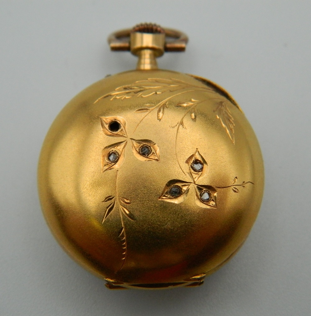 An 18 ct gold ladies fob watch. 2.5 cm diameter. 15.6 grammes total weight. - Image 2 of 7