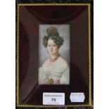 A 19th century miniature on ivory of a young lady, framed and glazed. 13 x 18 cm overall.