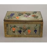 A 19th century Chinese coral and hardstone set jade box. 12.5 cm wide.