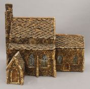 A 19th century cork model of a church. 36 cm long.