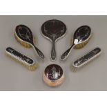 A silver and tortoiseshell dressing table set, hallmarked 1936,