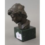 A bronze male bust on plinth base. 12.5 cm high.