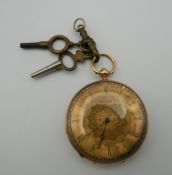 An 18 K gold fob watch. 3.5 cm diameter. 34.3 grammes total weight.