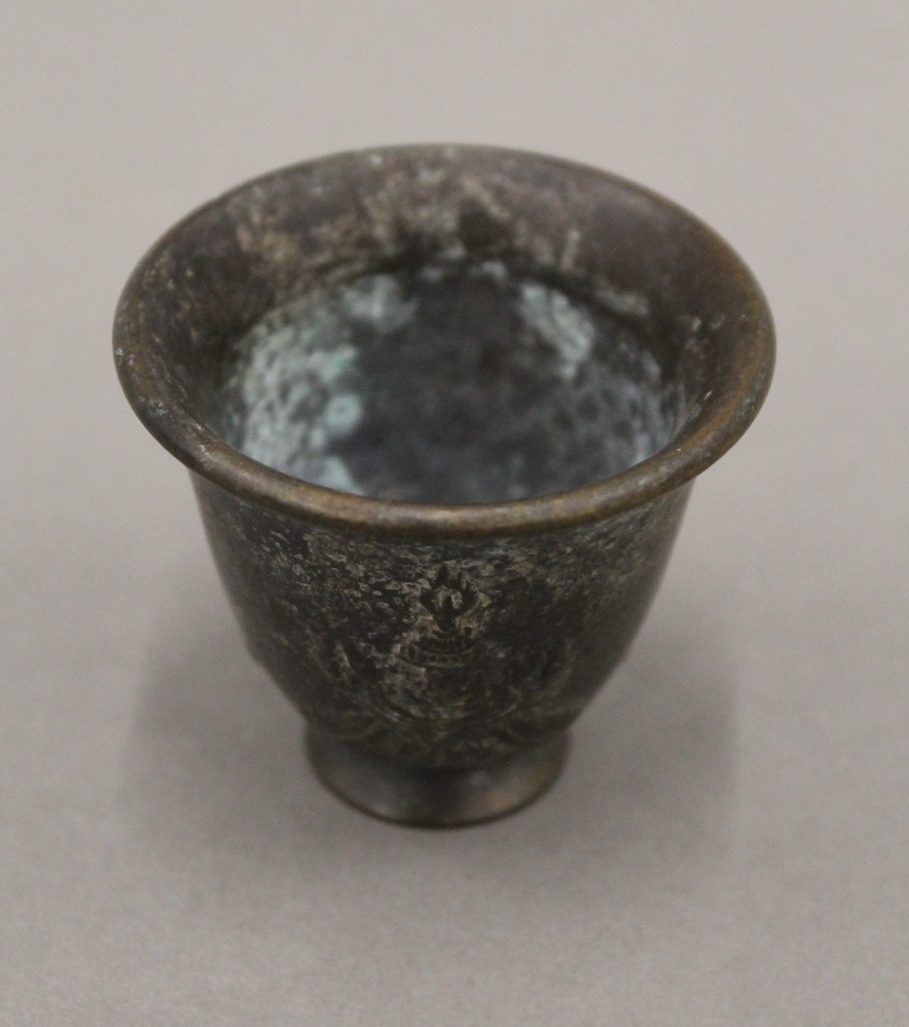 A small Chinese bronze cup. 4 cm high. - Image 2 of 3