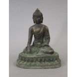 A Chinese bronze model of Buddha. 19 cm high.