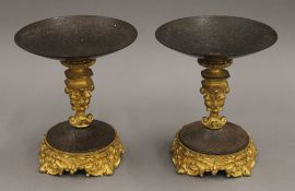 A pair of 19th century bronze and steel tazzas. 11 cm high.