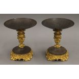 A pair of 19th century bronze and steel tazzas. 11 cm high.