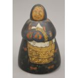 A painted wooden figural box. 18 cm high.