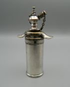 A vintage silver plated scent bottle. 8 cm high.